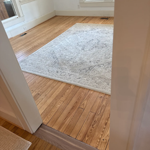 hardwood flooring with area rug